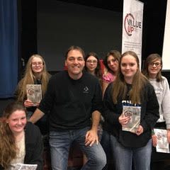 Mike Donahue with Students After Assembly Program